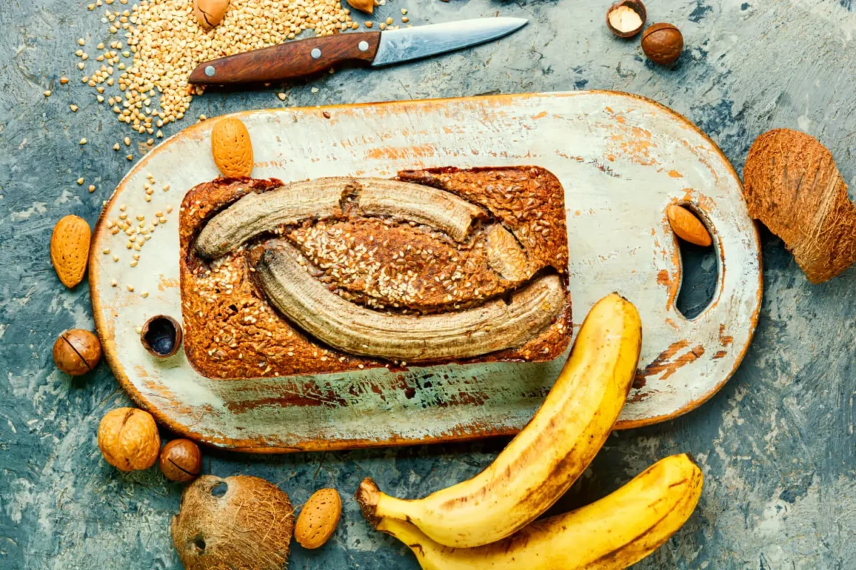 Banana bread on a rustic board, capturing the essence of Starbucks' bread's shelf life.