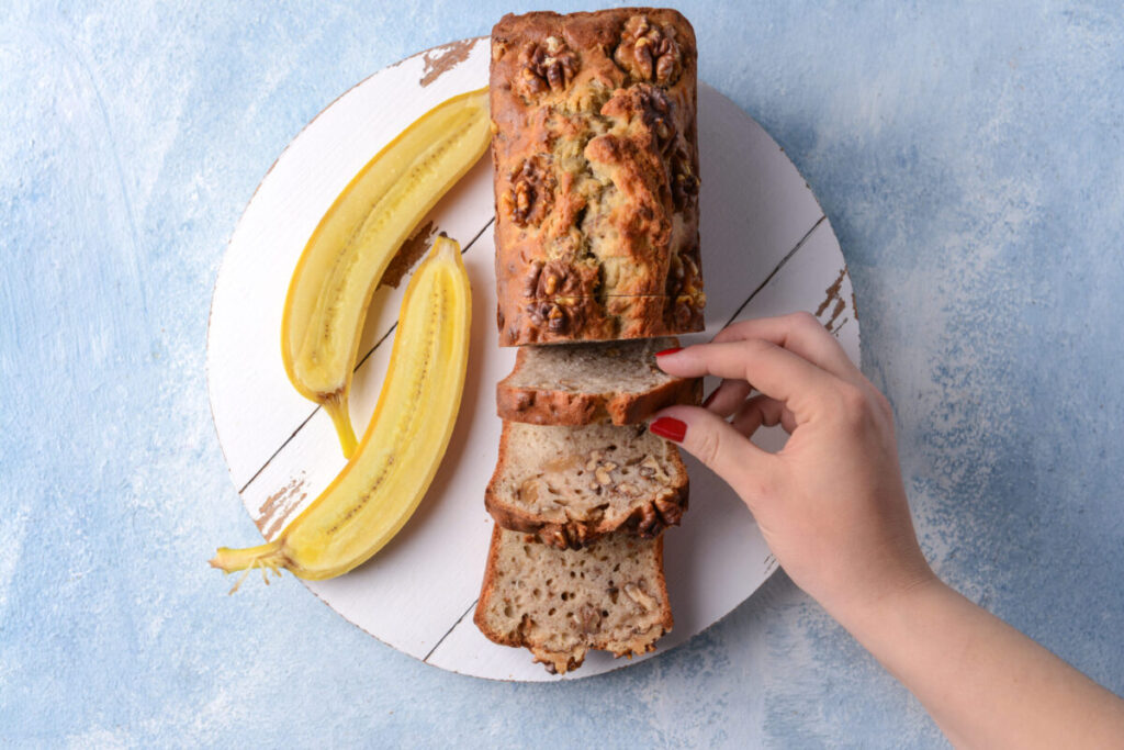 Fresh Starbucks Banana Bread slice with coffee - Learn how long Starbucks Banana Bread lasts.