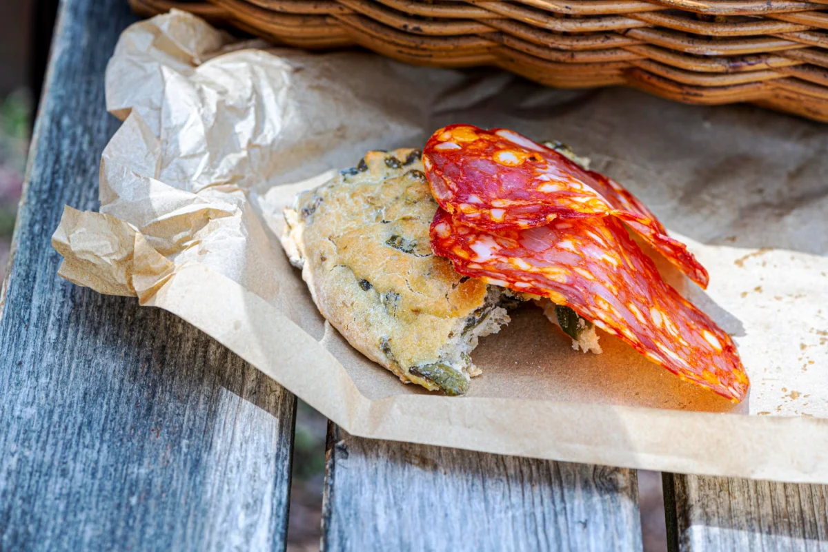 Sopressata slices on a rustic ciabatta sandwich